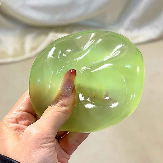 Chiboki coconut oil squishy, jade green grape colorway, translucent gooey ball