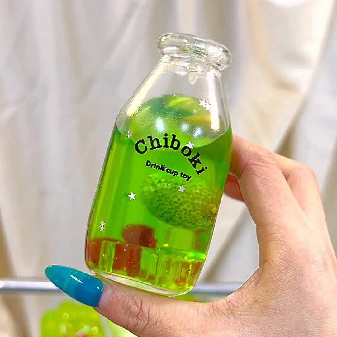 Clear Soda Bottle Squishy Ball – Melon Soda Bottle