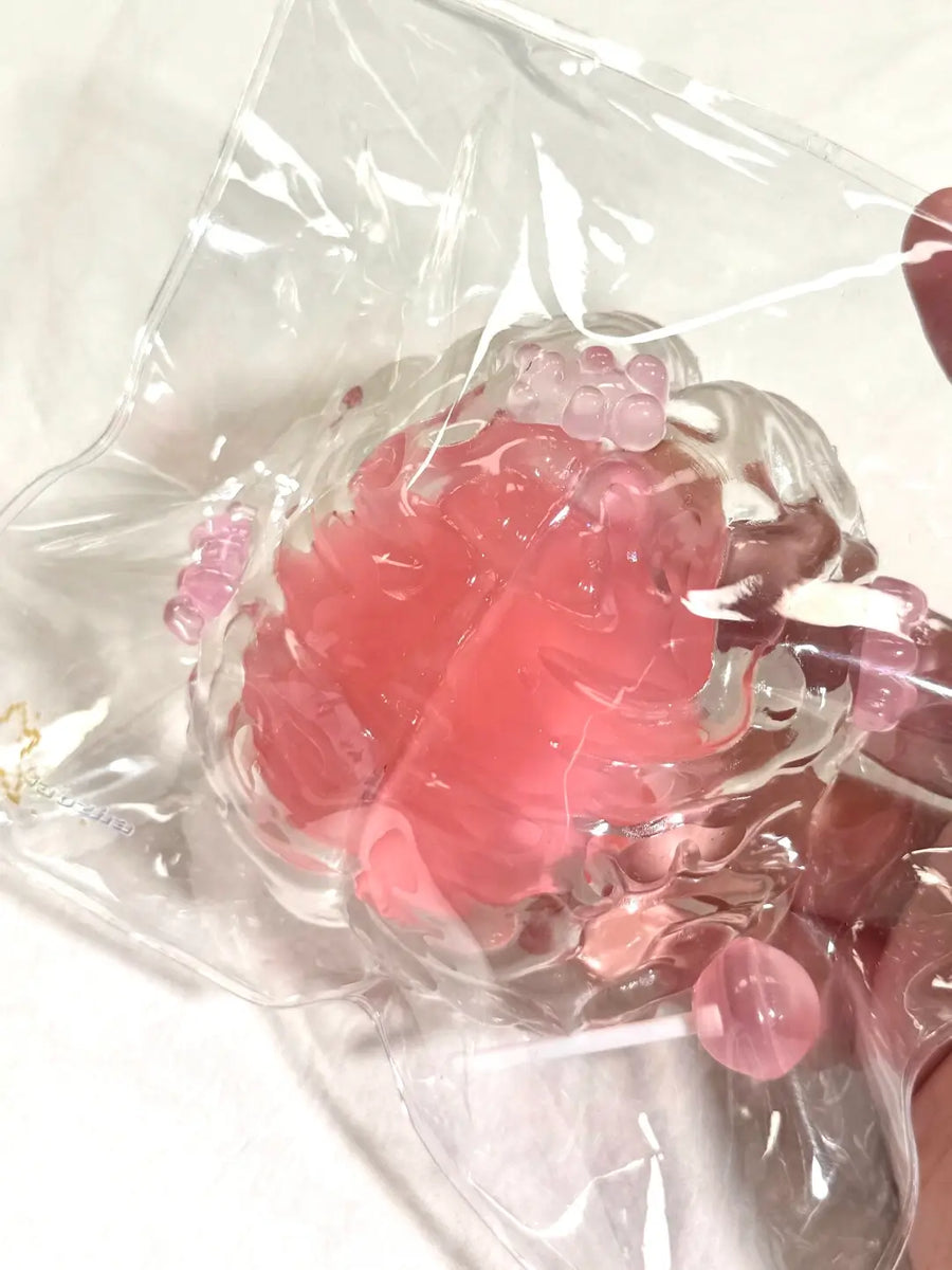 Lovebrain Flowing Jelly Squishy – Handle with Care!