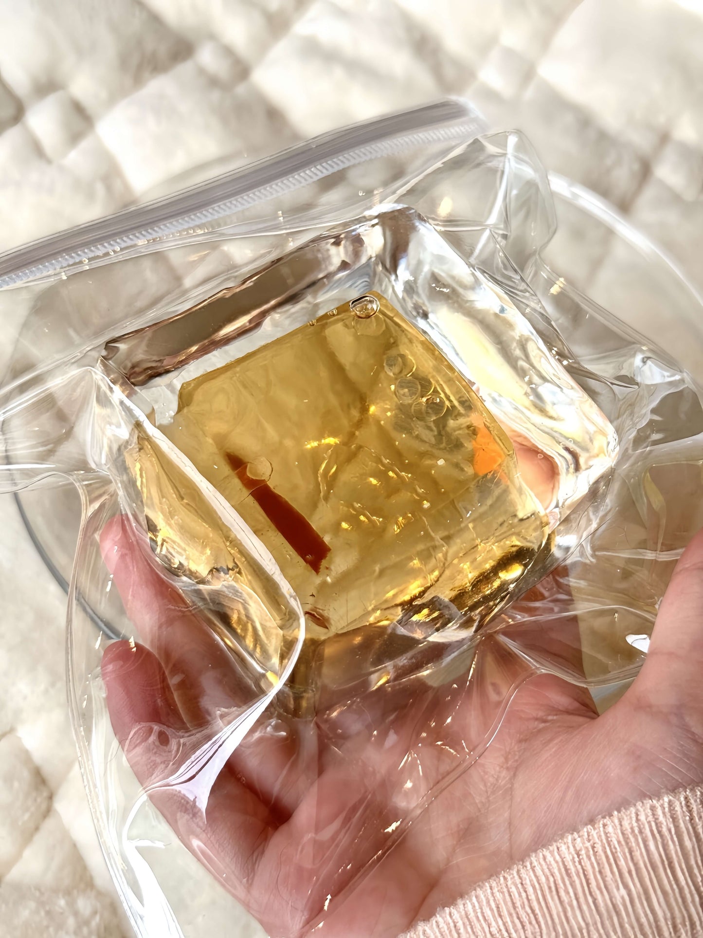 Lovesquishy's ultra-soft barley tea flowing sand ice block in clear bag