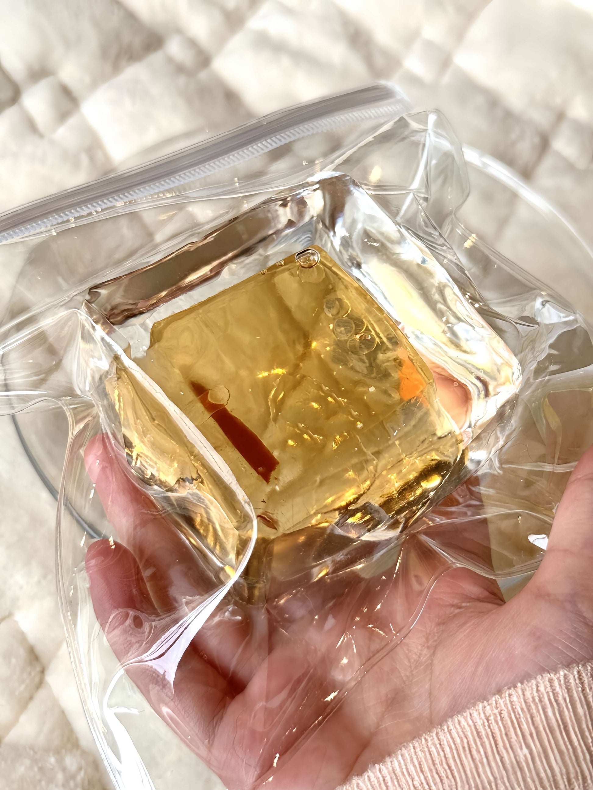 Lovesquishy's ultra-soft barley tea flowing sand ice block in clear bag