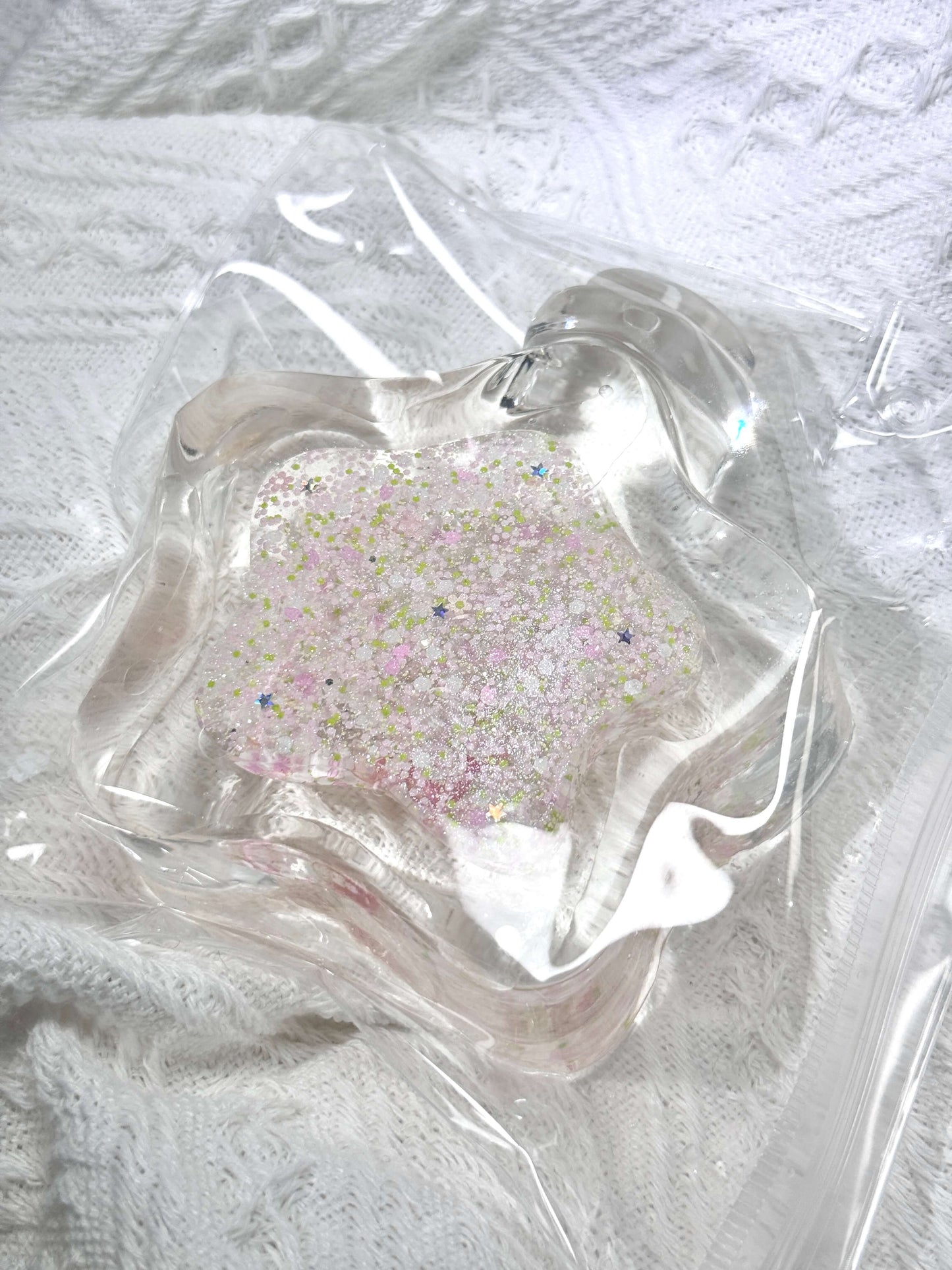 Handcrafted jumbo floral pink liquid sand star bottle squishy toy for stress relief