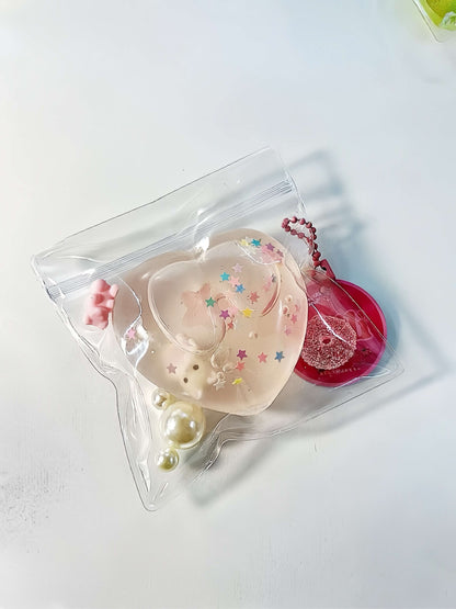 Pink heart-shaped handmade stress relief ball with cat treat design - Jelly Powder Cat Treats