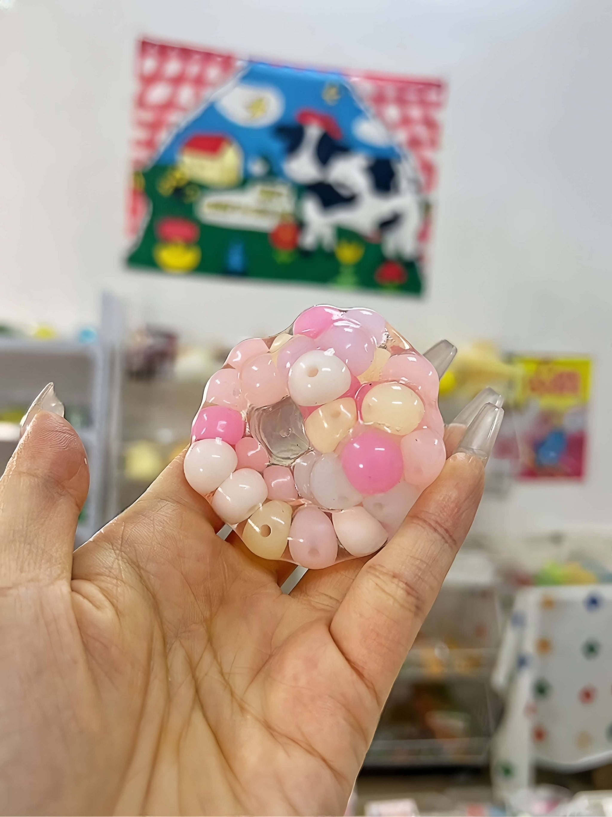Handmade light-colored pearl squishy ball for stress relief and sensory play