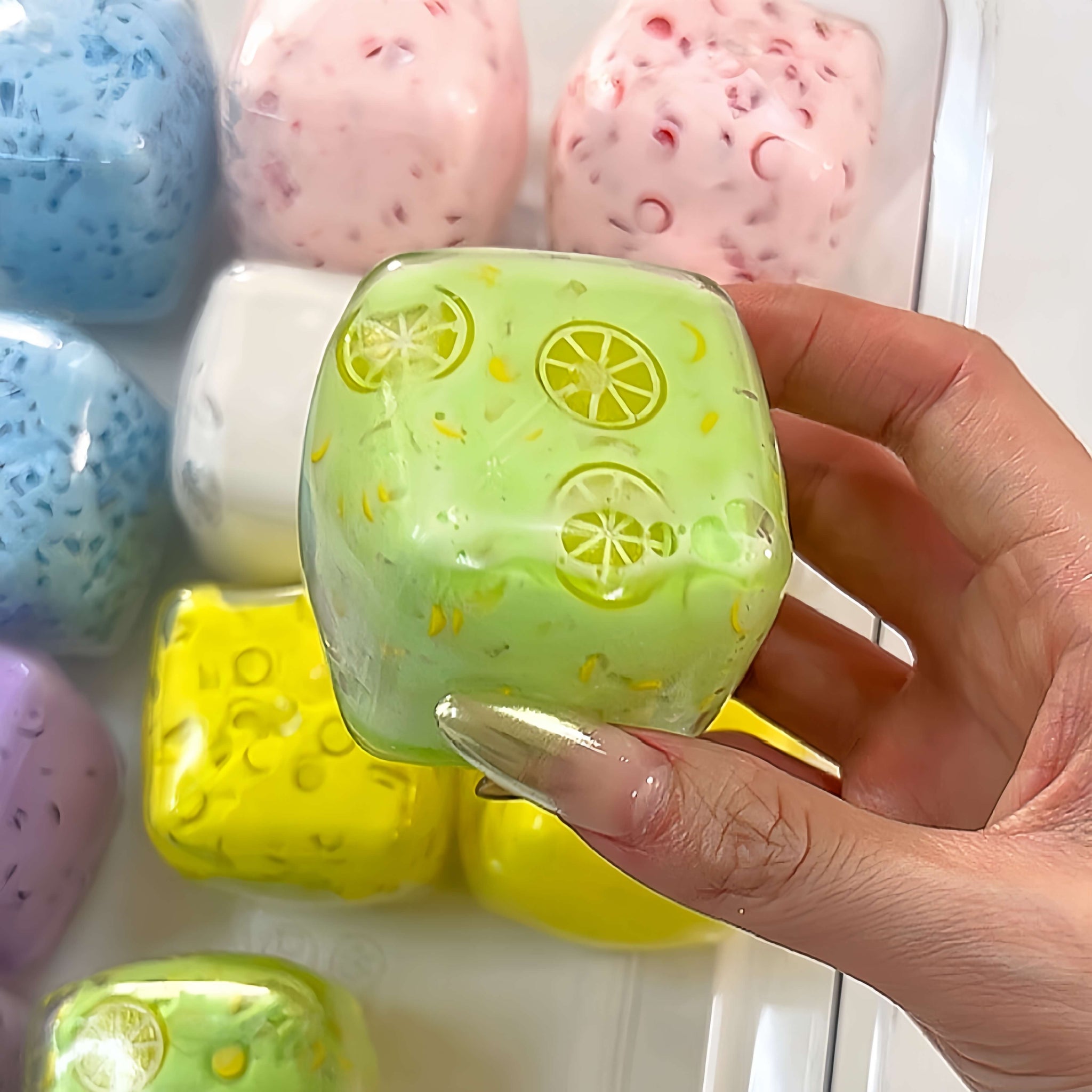 Green square handmade freeze-dried yogurt stress ball, lime flavor decompression fidget toy with citrus slices