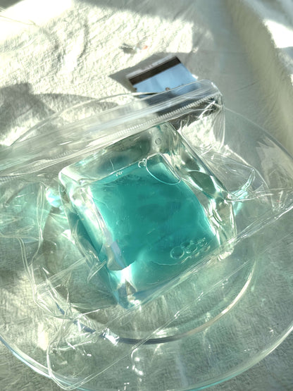 Mint-colored soft ice block in clear packaging