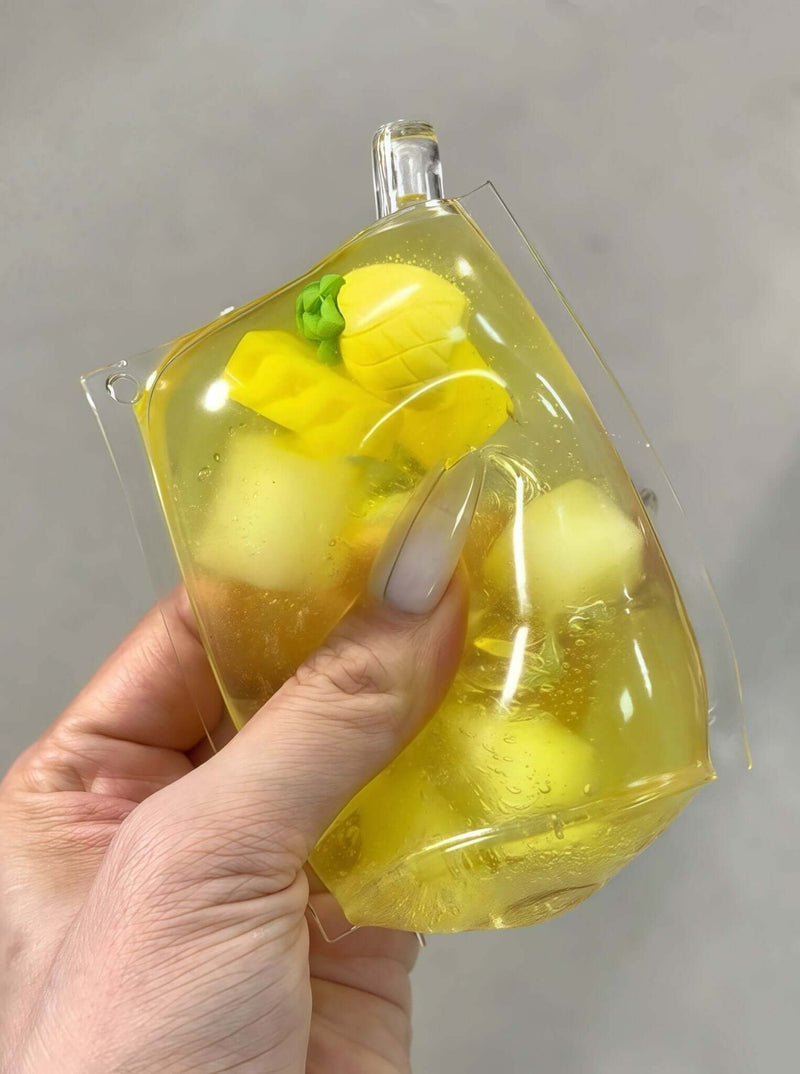 Pineapple squishy balls in yellow jelly packaging from lovesquishy