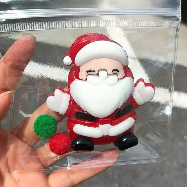 Santa Claus squishy with red suit, white beard, packaged in clear plastic – lovesquishy holiday collection