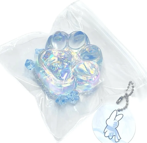 Dreamy blue cat paw transparent silicone squishy toy in clear packaging