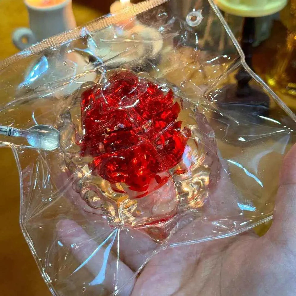 Lovebrain Flowing Jelly Squishy – Handle with Care!