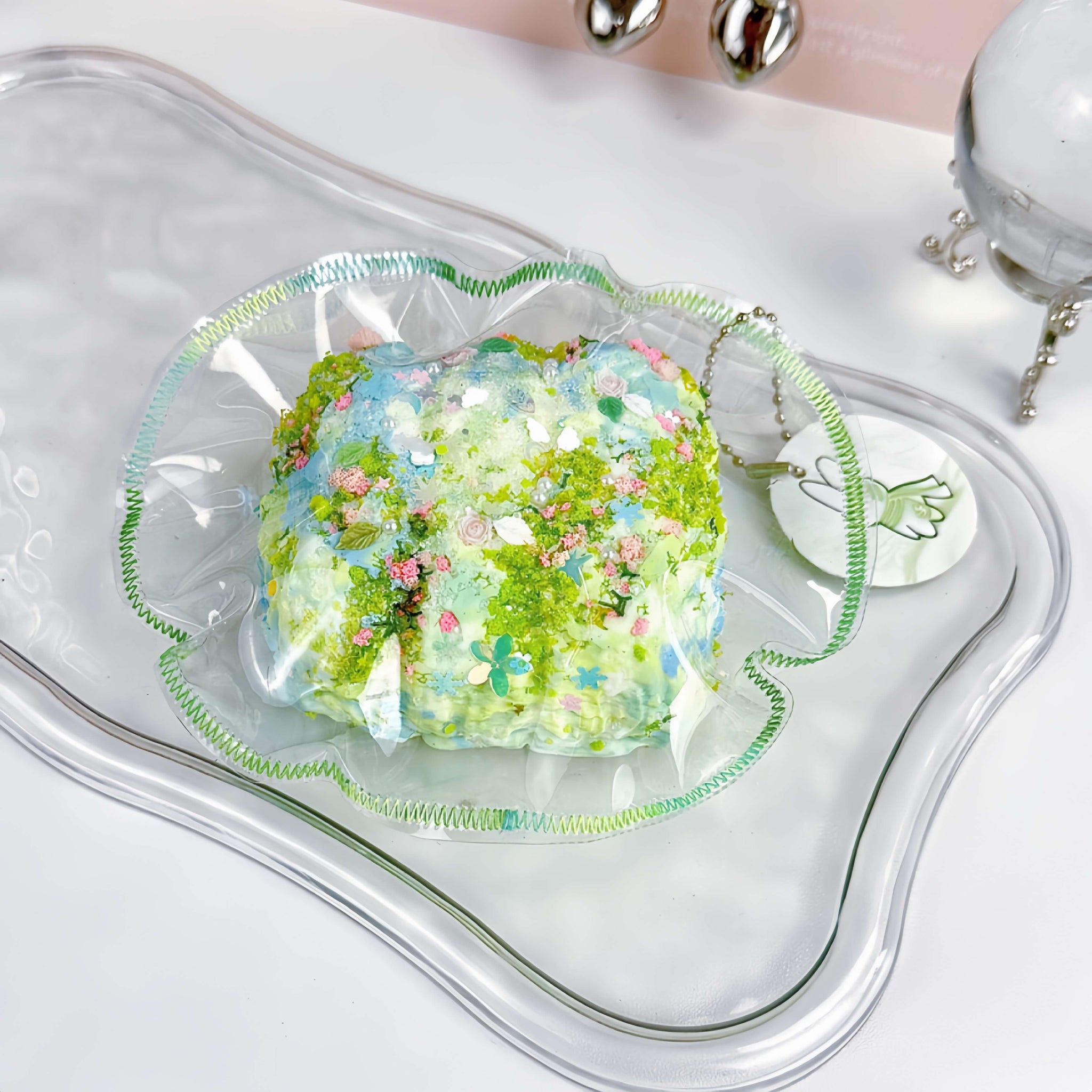 Clear silicone squishy Emerald Fantasy Butterfly Pool steamed bun with water burst effect