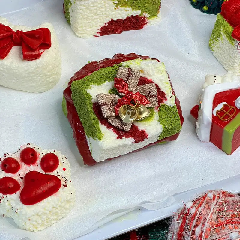 Triple layer matcha toast squishy with bells, red paw; soft holiday stress relief toy from lovesquishy