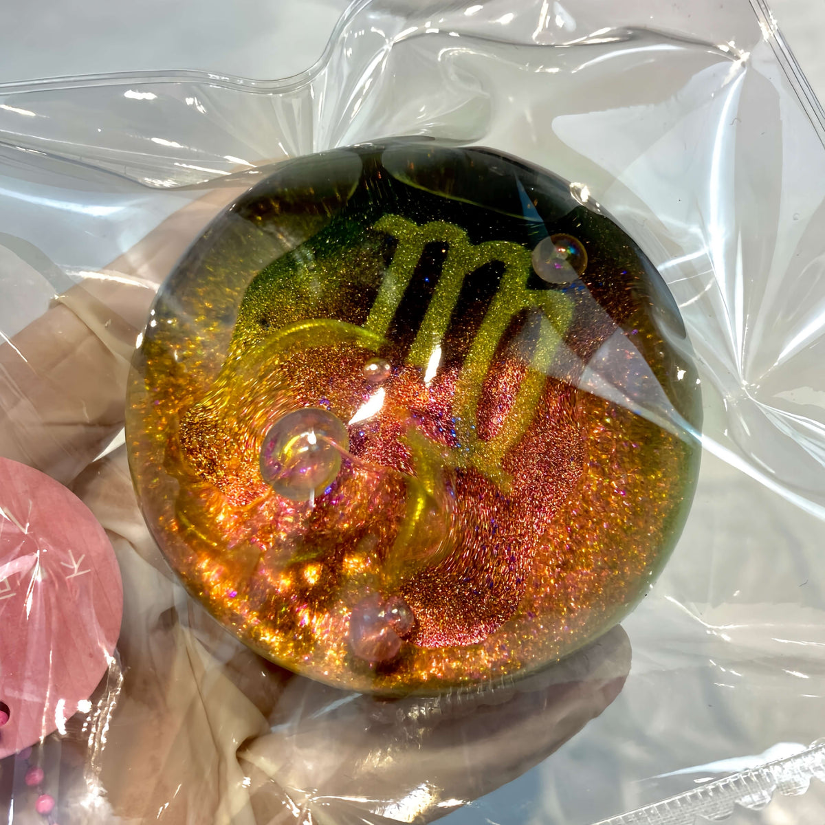 Clear silicone Virgo galaxy orb with neon nebula design from lovesquishy