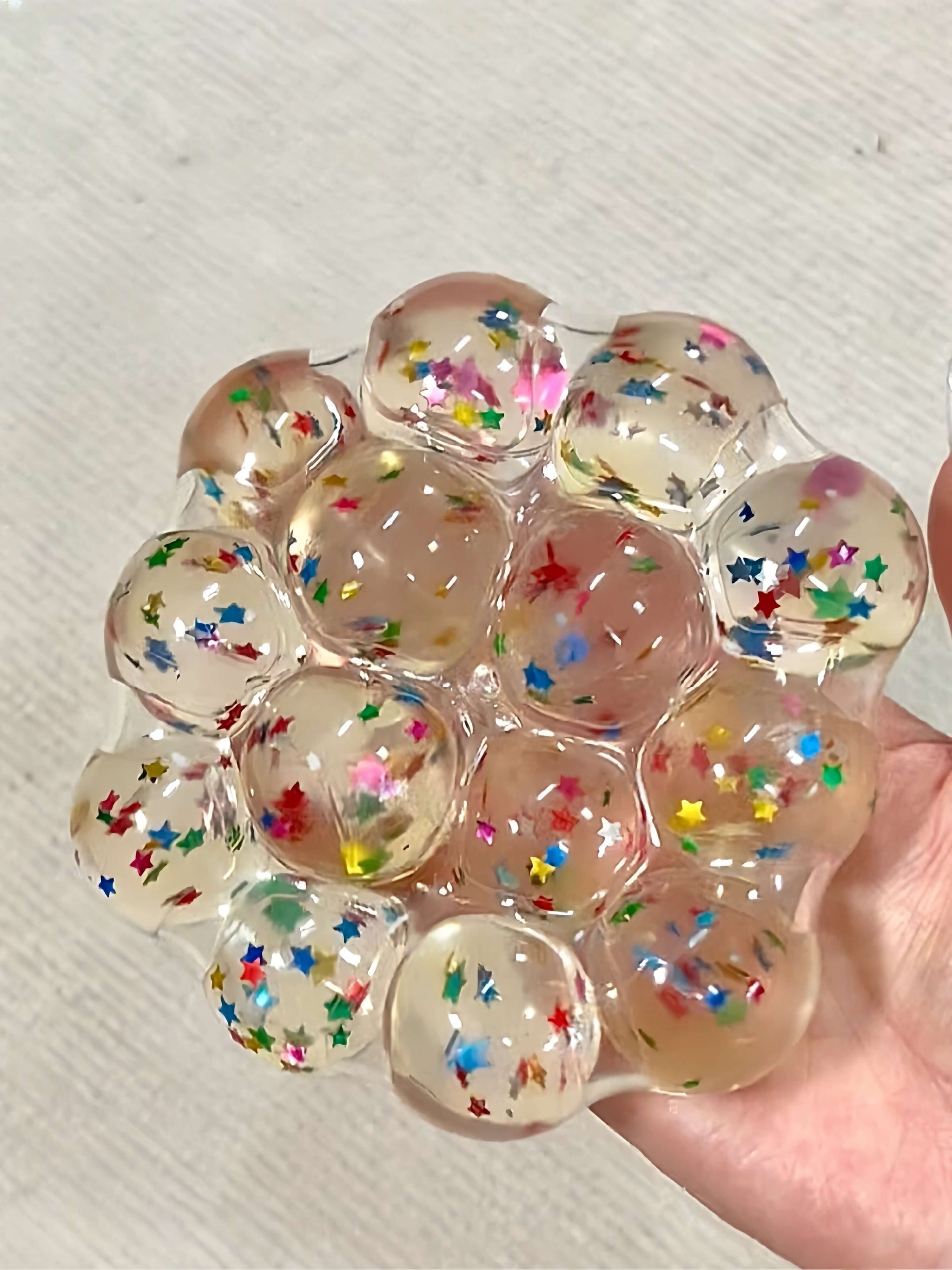 Lovesquishy star-filled jumbo pearl squishy ball, handmade stress relief toy